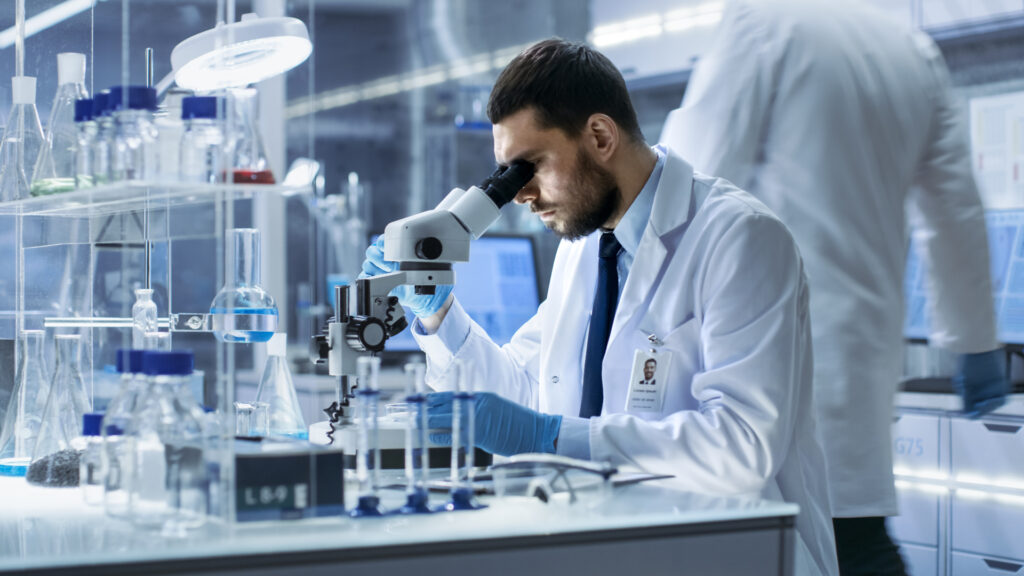 Man Looking at a Microscope